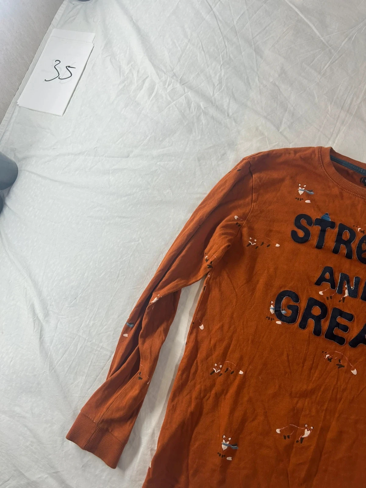 Blusa com estampa laranja Kiabi – photo 3